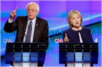 Hillary Rodham Clinton, right, and Sen. Bernie Sanders, of Vermont, speak during the CNN Democratic presidential debate Tuesday, Oct. 13, 2015, in Las Vegas. (AP Photo/John Locher)